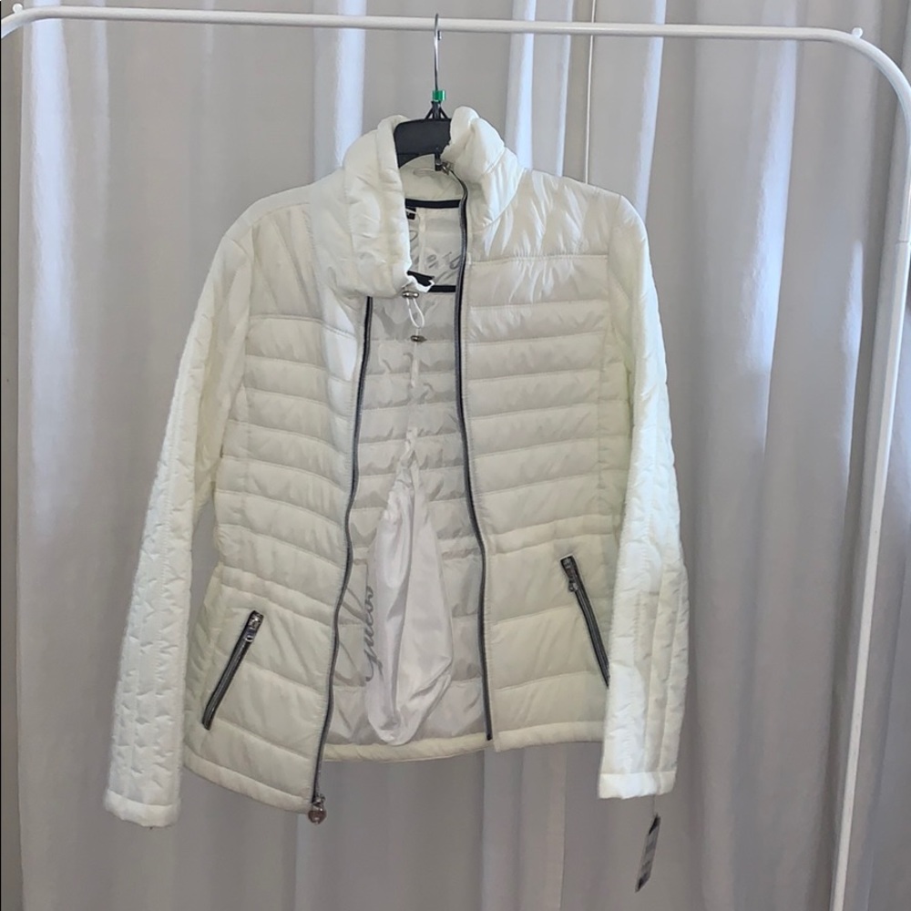 White puff jacket.